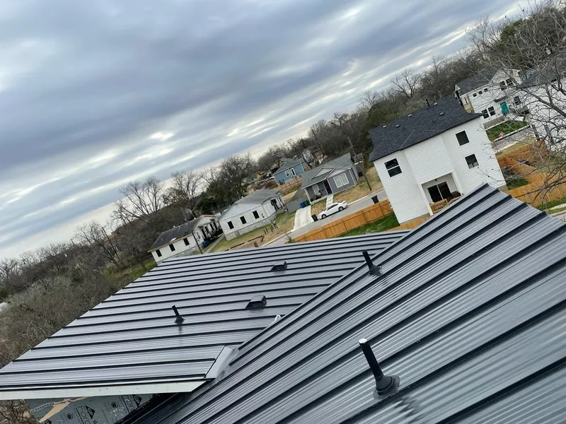 Standing seam metal roof panels with vents for Skylight Repair in Indian Hills